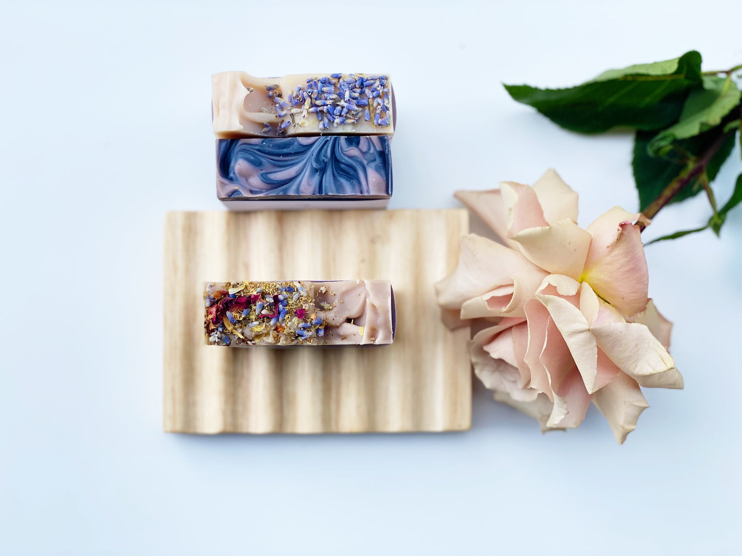 Mix of three soaps and a soap dish